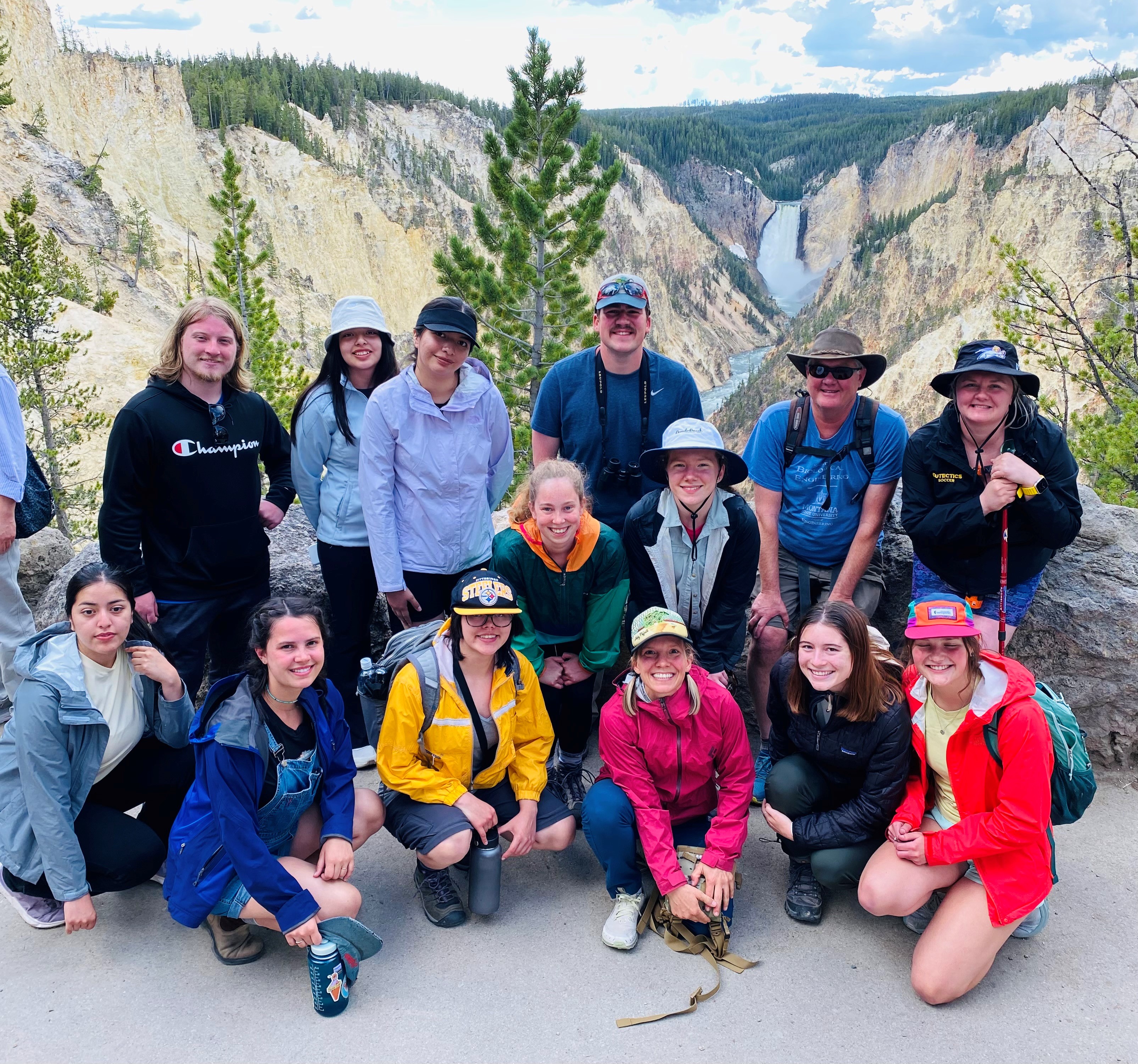 Photo of REU students in Yellowstone National Park in front of the Grand Canyon of the Yellowstone.